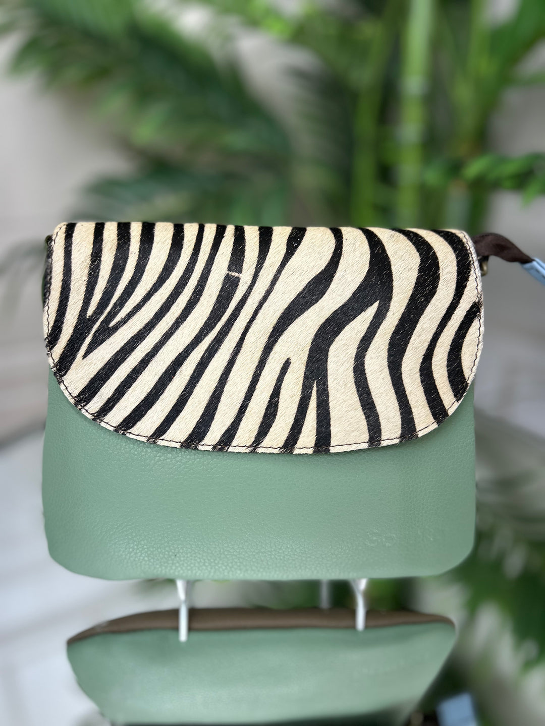 Soruka (81069) Mini Animal Print Clutch with Detachable Strap